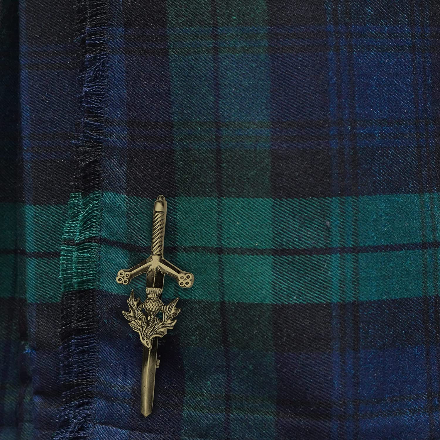 Antique Kilt Pin with a detailed thistle design, perfect for adding elegance to your kilt outfit.